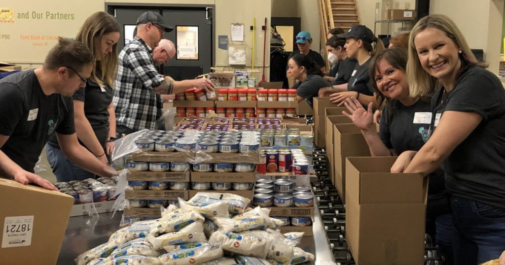 E&S employees package meals at Food Bank for the Heartland