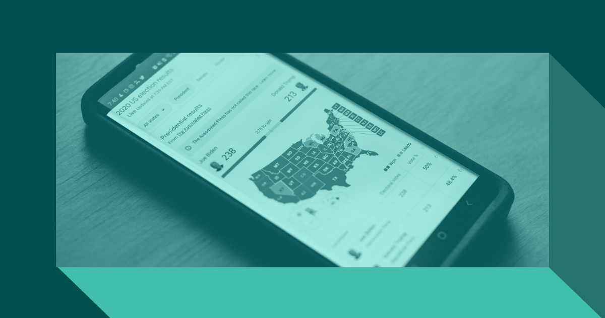 A phone is open on a map of election data. The image is obscured by a teal overlay.