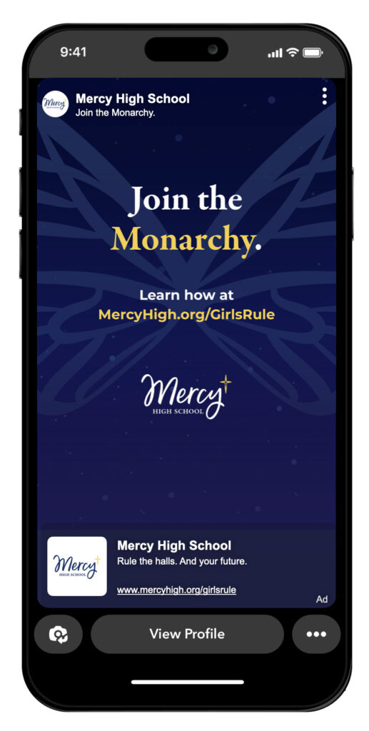 Social post end card. The design has a navy background with type over the top that says "Join the Monarchy" with support text and the Mercy logo. The post is shown on a black smart phone.