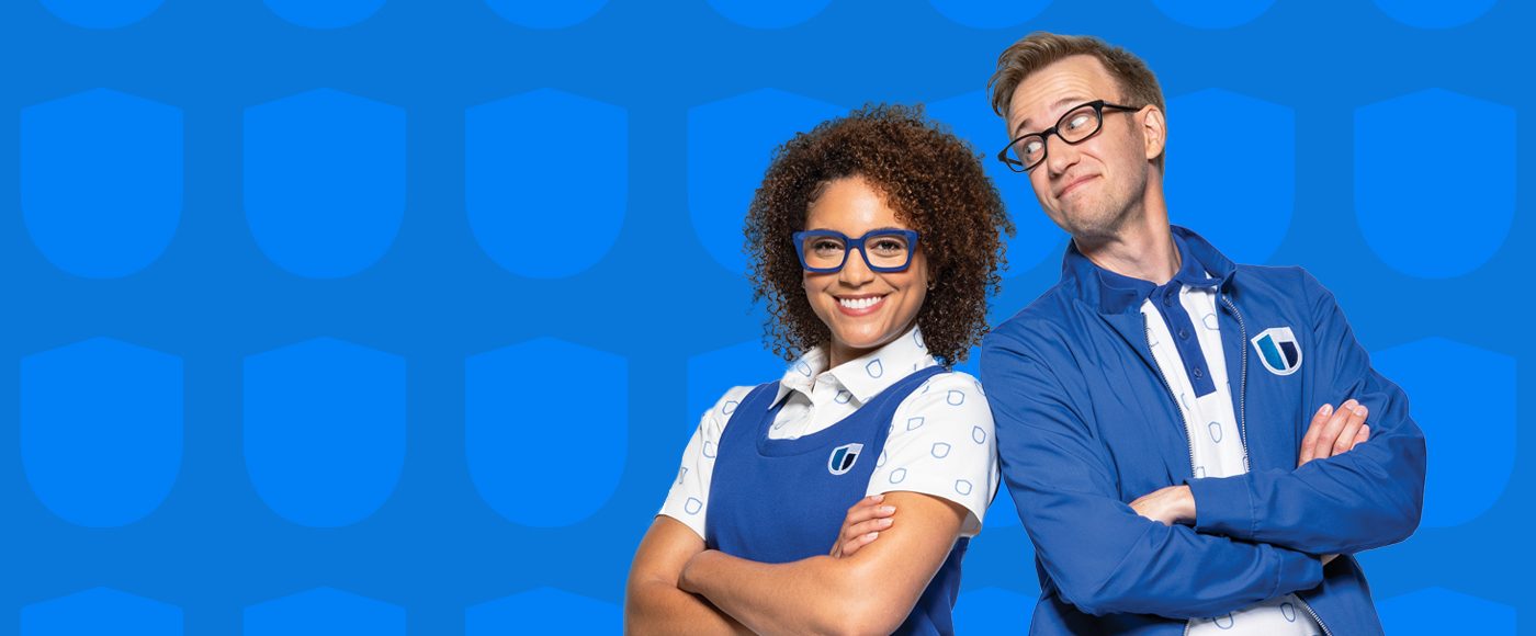 Berk and Berklyn, biBerk's spokespeople, standing back to back with their arms crossed and smiling.